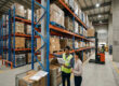 Warehouse pallet racking system installation in Ahmedabad showing 4-level selective racks with forklift operation and organized storage capacity