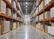 “Selective pallet racks holding loaded pallets of different sizes in a warehouse aisle.”